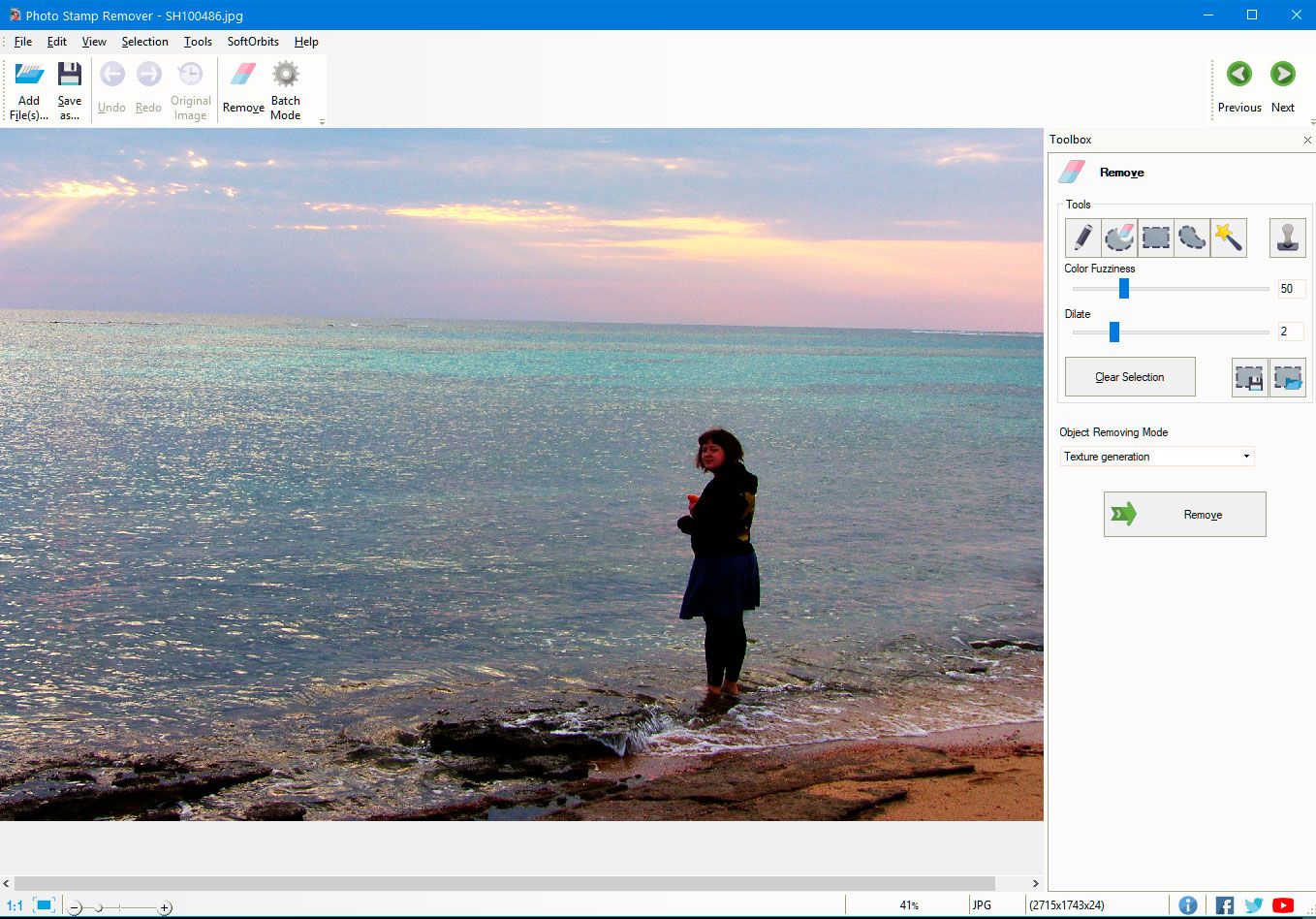 Photo Stamp Remover: выделение области маркером для удаления объекта