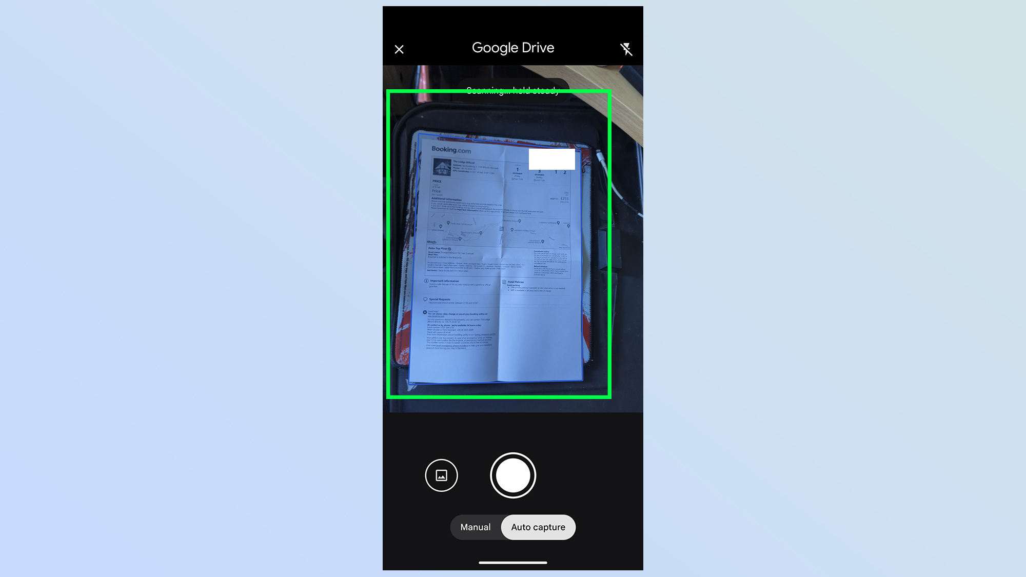 Синяя рамка вокруг документа в видоискателе Google Drive Scanner